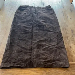 100% genuine leather, brown maxi skirt. Slit in the back. Size 16.