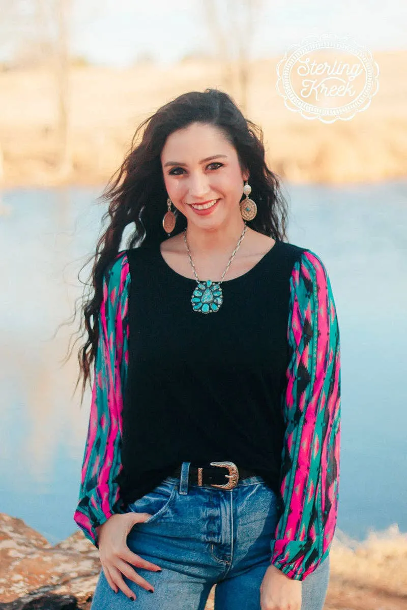 Black top with sheer colorful long sleeves
