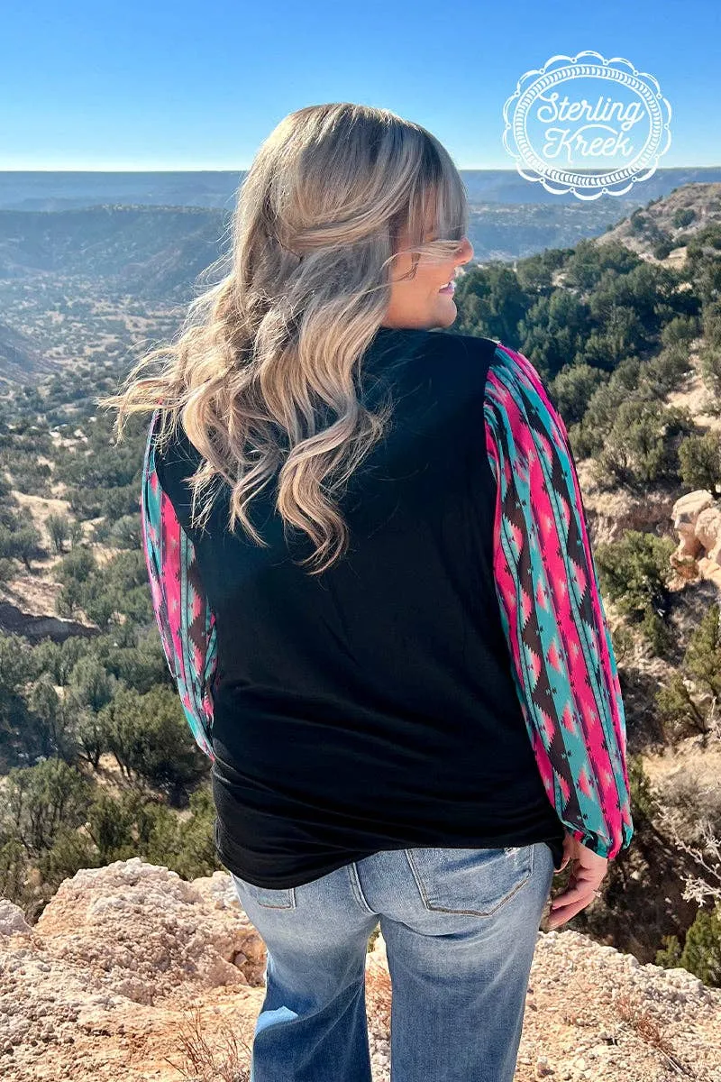 Black top with sheer colorful long sleeves