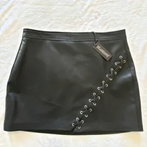 BLANK NYC Spend The Night Lace Up Faux Leather Mini Skirt--Sz 32