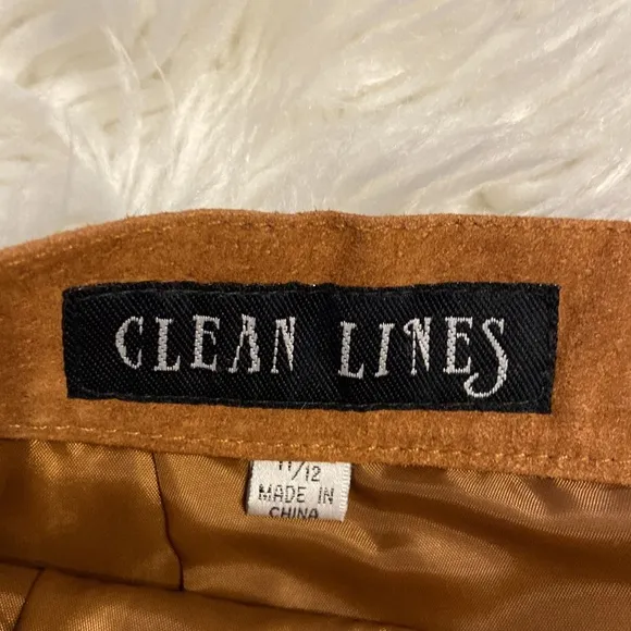 CLEAN LINES LEATHER MINI SKIRT LENGTH 16” WAIST 28/29” COLOR TAN ZIPPER BACK
