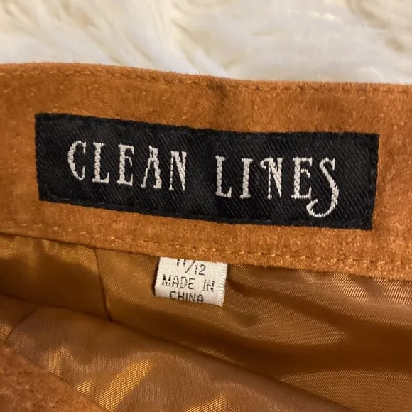 CLEAN LINES LEATHER MINI SKIRT LENGTH 16” WAIST 28/29” COLOR TAN ZIPPER BACK