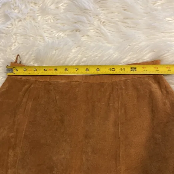 CLEAN LINES LEATHER MINI SKIRT LENGTH 16” WAIST 28/29” COLOR TAN ZIPPER BACK