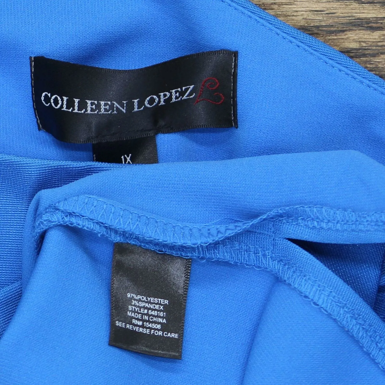 Colleen Lopez Plus Size Asymmetric Off-Shoulder Flounce Top