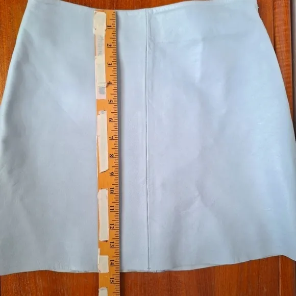 Esprit 90s Powder blue genuine leather satin lined mid rise A line raw hem skirt