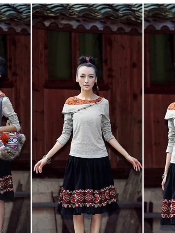 sloping embroidered shoulder top